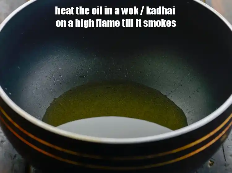 Step 16 – <p>To prepare the <strong>Chinese manchow soup</strong>, heat the 2 tbsp <a href="https://www.tarladalal.com/glossary-oil-671i"><u>oil</u></a> in a wok …
