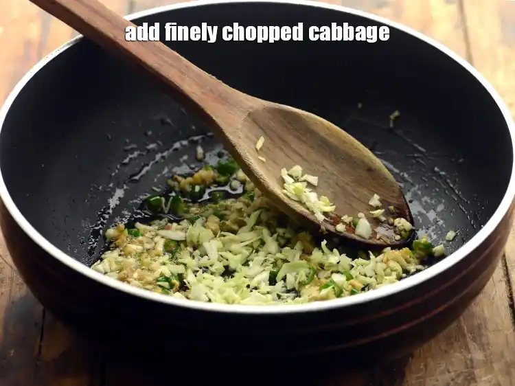 Step 20 – <p>Add the 2 tbsp finely <a href="https://www.tarladalal.com/glossary-cabbage-patta-gobi-kobi-248i#ing_2363"><u>chopped cabbage</u></a>. It can be replaced with purple cabbage.</p>