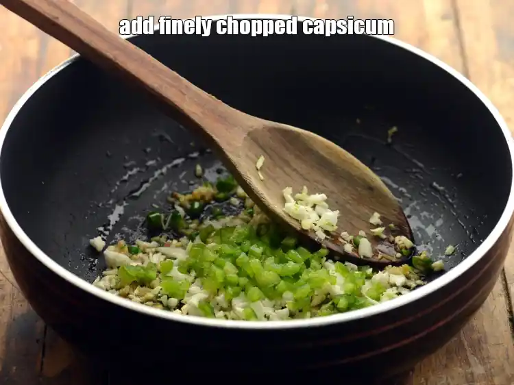 Step 22 – <p>Add 2 tbsp finely <a href="https://www.tarladalal.com/glossary-capsicum-shimla-mirch-bell-pepper-163i#ing_2311"><u>chopped capsicum</u></a>. To make the <strong>Manchow soup</strong> more colorful, you …