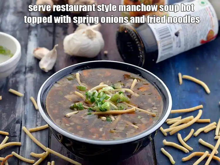Step 27 – <p>Serve <strong>vegetable manchow soup</strong> hot topped with <span style="background-color:rgb(255,255,255);color:rgb(0,0,0);">finely </span><a href="https://www.tarladalal.com/glossary-spring-onion-greens-hare-pyaz-ke-patte-445i#ing_2424"><u>chopped spring onion greens</u></a> and …