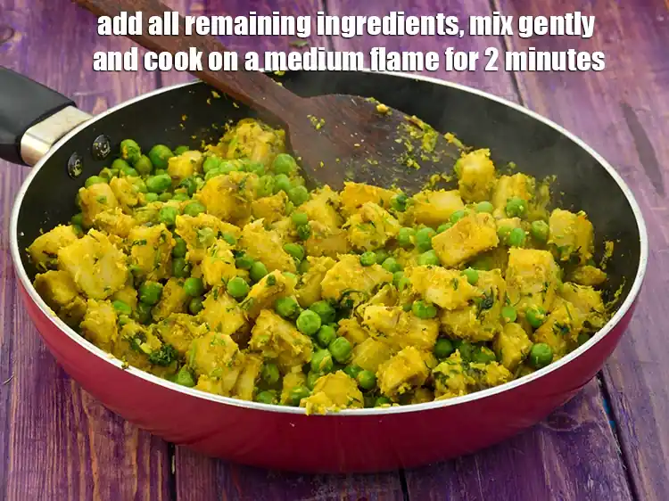 Step 6 – <p><strong>When the seeds crackle,</strong> add all the remaining ingredients, add 1 1/2 tsp <a href="https://www.tarladalal.com/glossary-green-chilli-paste-hari-mirch-ki-paste-mirchi-paste-333i"><u>green …