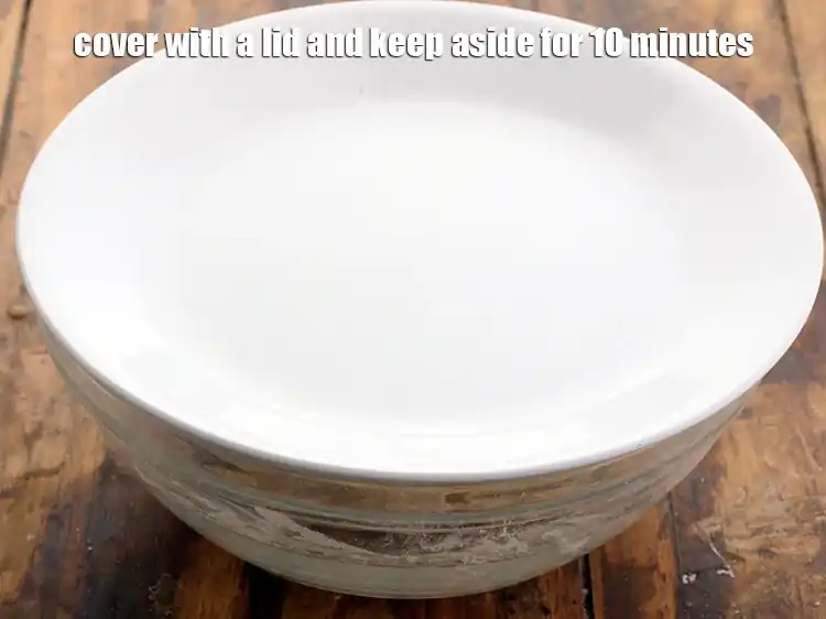 Step 2 – <p><span style="background-color:rgb(255,255,255);color:rgb(0,0,0);">Cover with a lid and keep aside for 10 minutes.</span></p>