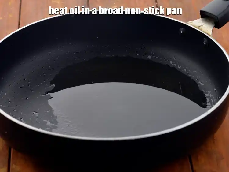 Step 4 – <p><span style="background-color:rgb(255,255,255);color:rgb(0,0,0);">Heat the </span>1 tsp <a href="https://www.tarladalal.com/glossary-oil-671i"><u>oil</u></a><span style="background-color:rgb(255,255,255);color:rgb(0,0,0);"> in a broad non-stick pan.</span></p>