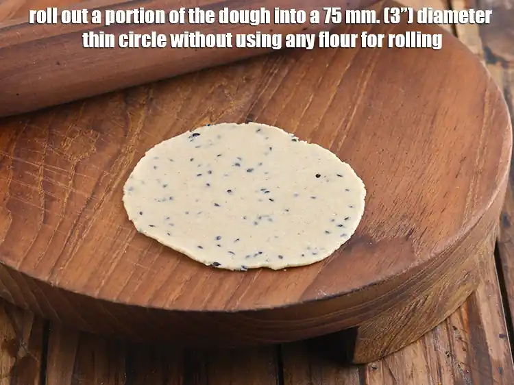 Step 8 – <p>Roll out a portion of the dough into a 75 mm. (3”) diameter thin circle …
