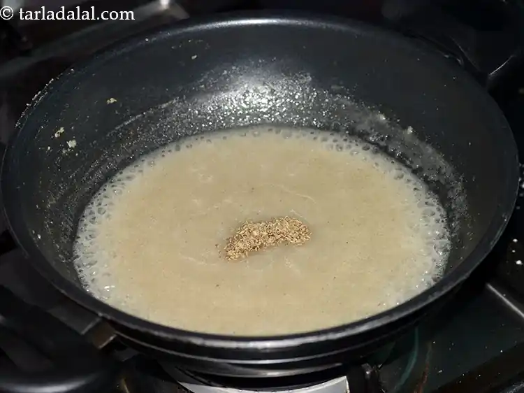 Step 8 – <p>Add the 1/8 tsp <a href="https://www.tarladalal.com/glossary-carom-seeds-ajwain-Thymol-seeds-bishops-weed-266i"><u>carom seeds (ajwain)</u></a> for making <strong>bajra raab for breastfeeding.</strong></p>