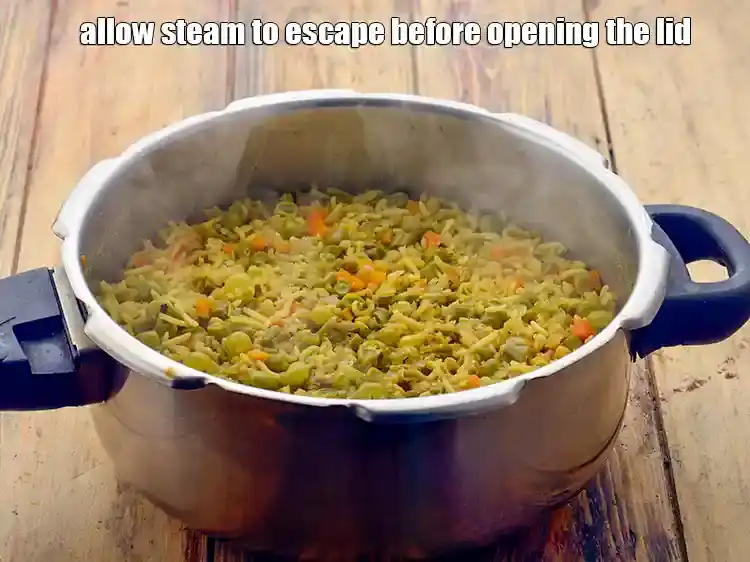 Step 10 – <p>Allow the steam to escape before opening the lid.</p>