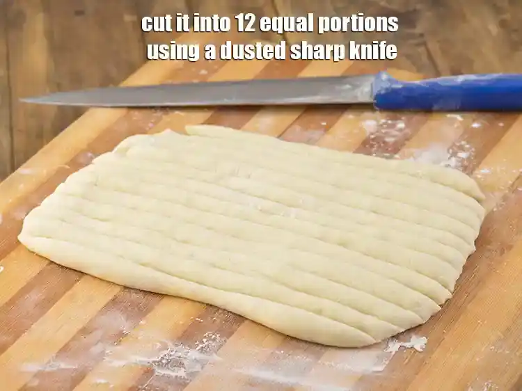 Step 16 – <p>Cut it into 12 equal portions using a dusted sharp knife.</p>