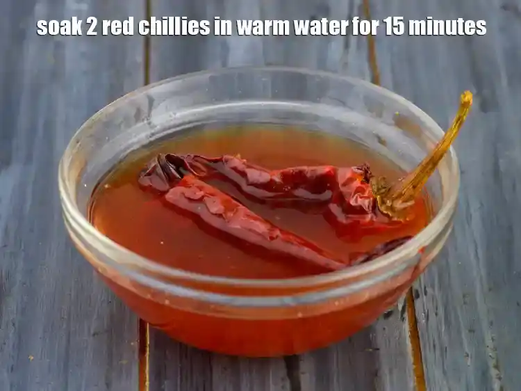 Step 20 – <p><span style="background-color:rgb(255,255,255);color:rgb(0,0,0);">To make</span><strong> Garlic Tomato Chutney, </strong><span style="background-color:rgb(255,255,255);color:rgb(0,0,0);">soak 2 red chillies in warm water for …
