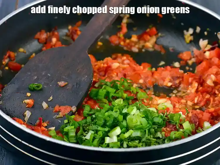 Step 14 – <p>Add the 1 tbsp finely <a href="https://www.tarladalal.com/glossary-spring-onion-greens-hare-pyaz-ke-patte-445i#ing_2424"><u>chopped spring onion greens</u></a>. These add a great mouthfeel …