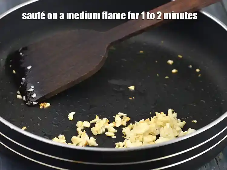 Step 5 – <p>Add 6 to 8 large sized <a href="https://www.tarladalal.com/glossary-garlic-lehsun-lahsun-348i#ing_2537"><u>garlic (lehsun) cloves </u></a>, finely chopped to it. …