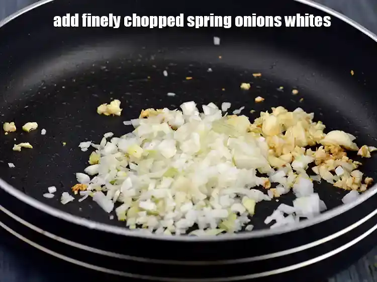 Step 6 – <p>Add the 1/4 cup <a href="https://www.tarladalal.com/glossary-spring-onion-hara-pyaz-443i#ing_2384"><u>chopped spring onions whites</u></a> now. The spring onion whites lend …