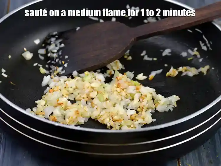 Step 7 – <p>Sauté the spring onions whites and garlic on a medium flame for 1 to 2 …