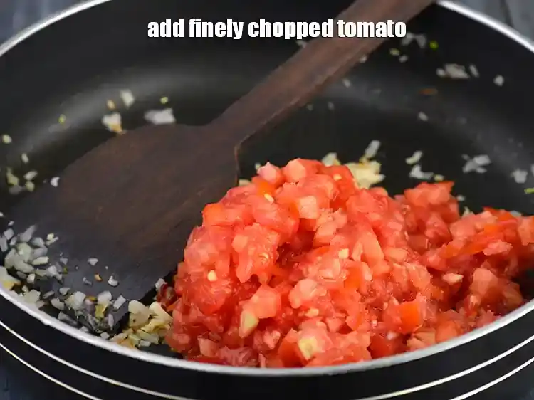 Step 9 – <p>Then add 1 cup finely <a href="https://www.tarladalal.com/glossary-tomatoes-tamatar-639i#ing_2361"><u>chopped tomato</u></a>. While chopping them, avoid the white part …