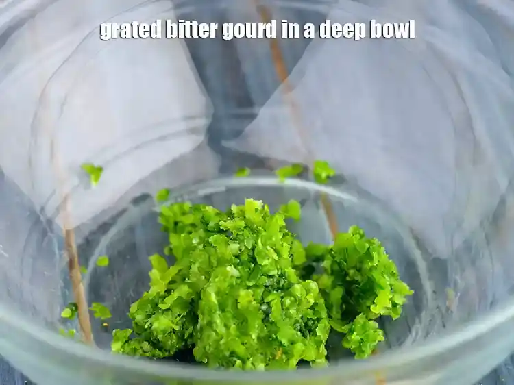 Step 7 – <p>Grated bitter gourd in a deep bowl.</p>