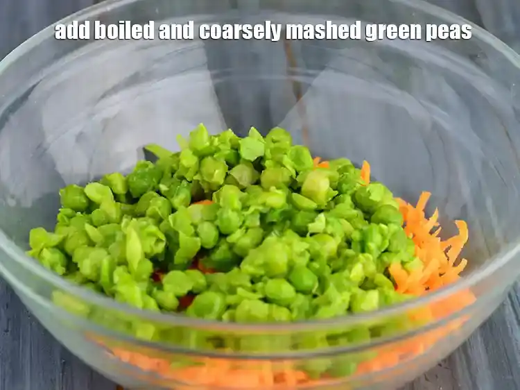 Step 9 – <p>Add the fiber rich 3/4 cup boiled and coarsely mashed <a href="https://www.tarladalal.com/glossary-green-peas-matar-hare-matar-vatana-180i"><u>green peas</u></a><u>.</u></p>