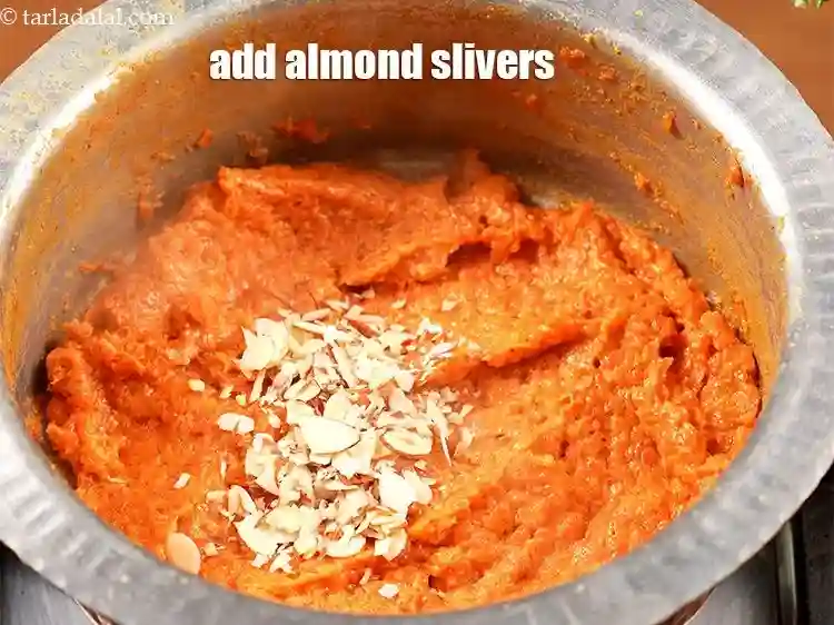 Step 13 – <p>Add 1 tbsp <a href="https://www.tarladalal.com/glossary-almond-slivers-slivered-almonds-664i">almond (badam) slivers</a>.</p>