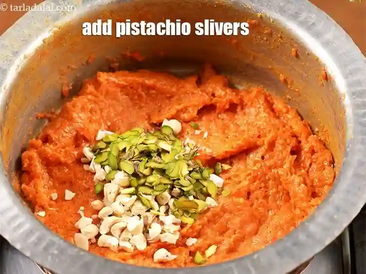 Step 15 – <p>Add 1 tbsp <a href="https://www.tarladalal.com/glossary-pistachio-slivers-894i">pistachio slivers</a>.&nbsp;</p>