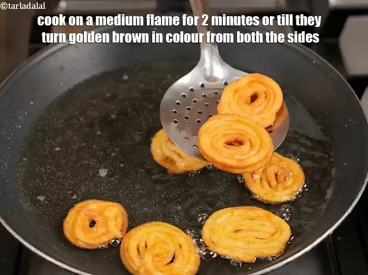 Step 26 – <p>Cook on a medium flame for 2 minutes or till they turn golden brown in …
