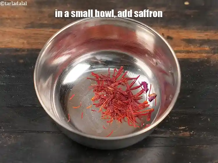 Step 10 – <p>Meanwhile, in a small bowl, add 1/4 tsp saffron.</p>