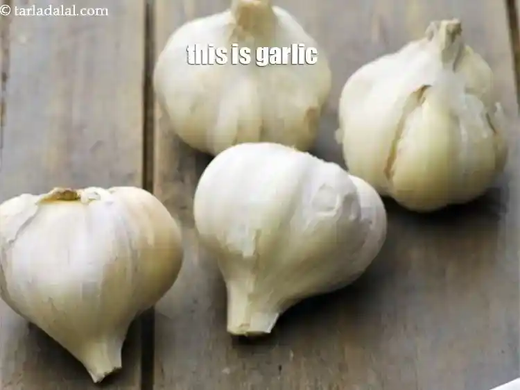 Step 2 – <p>This is how <a href="https://www.tarladalal.com/glossary-garlic-lehsun-lahsun-348i">garlic</a> looks like.</p>