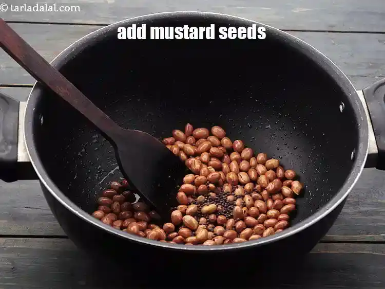 Step 8 – <p>Add the <a href="https://www.tarladalal.com/glossary-mustard-seeds-sarson-rai-sarson-ke-beej-525i">mustard seeds</a>.</p>