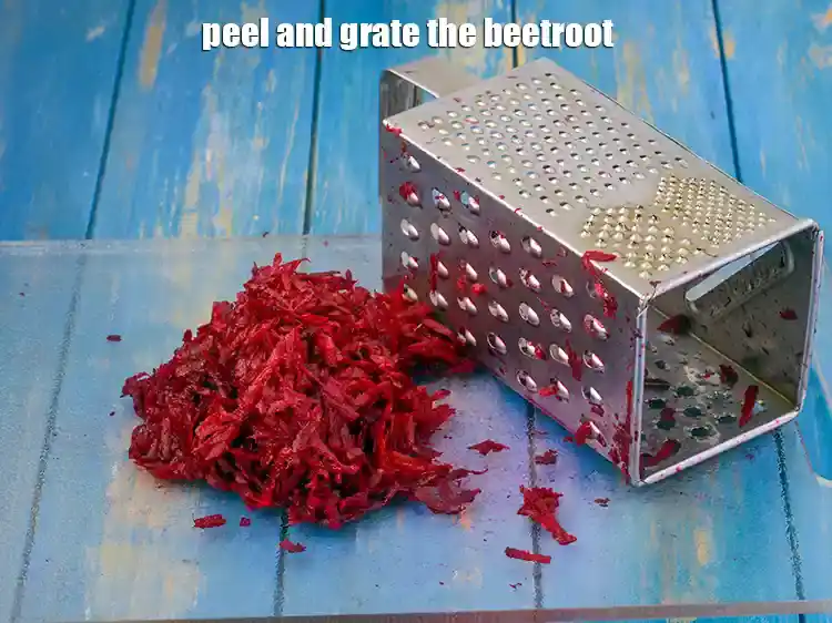 Step 2 – <p>Peel and grate the 1 <a href="https://www.tarladalal.com/glossary-beetroot-chukandar-201i"><u>beetroot</u></a>. Keep aside.</p>