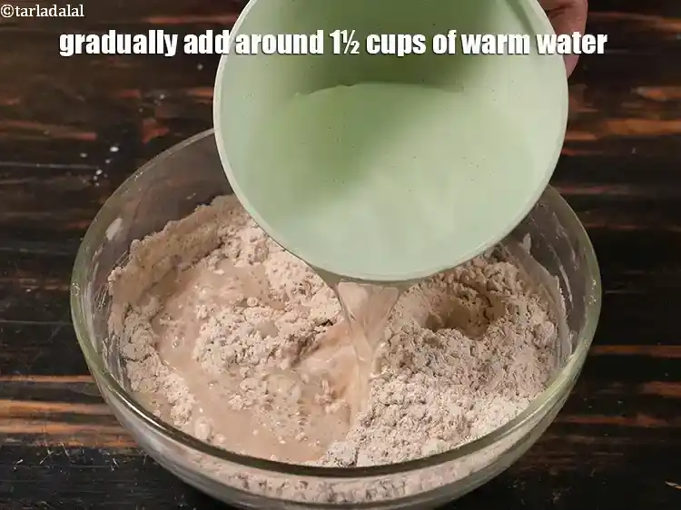 Step 24 – <p><span style="background-color:rgb(255,255,255);color:rgb(0,0,0);">Gradually add around 1½ cups of warm water.</span></p>