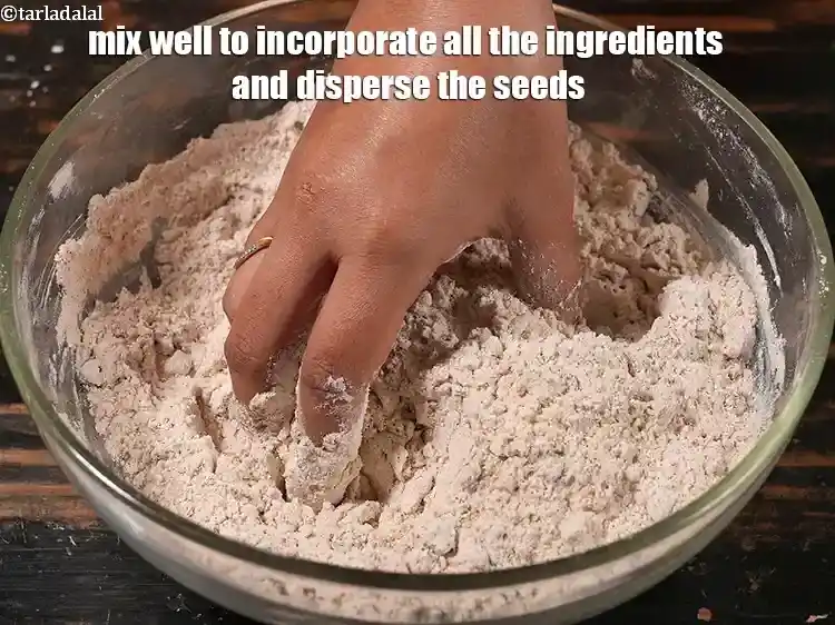 Step 25 – <p>Mix well to incorporate all the ingredients and disperse the seeds.</p>
