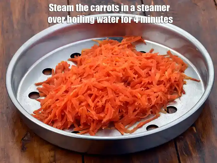 Step 1 – <p>To make <strong>carrot halwa </strong>for<strong> Carrot Pancake Sizzler</strong>,<strong> </strong>Steam the 1 1/2 cups thickly <a …