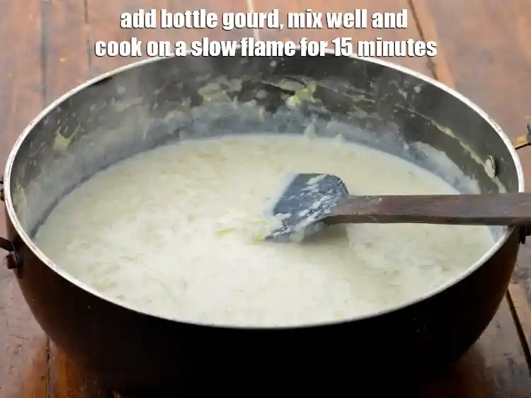 Step 3 – <p><span style="background-color:rgb(255,255,255);color:rgb(0,0,0);">Add the </span>2 cups <a href="https://www.tarladalal.com/glossary-bottle-gourd-lauki-doodhi-ghiya-252i#ing_2425"><u>grated bottle gourd (doodhi / lauki)</u></a><span style="background-color:rgb(255,255,255);color:rgb(0,0,0);">, mix well …