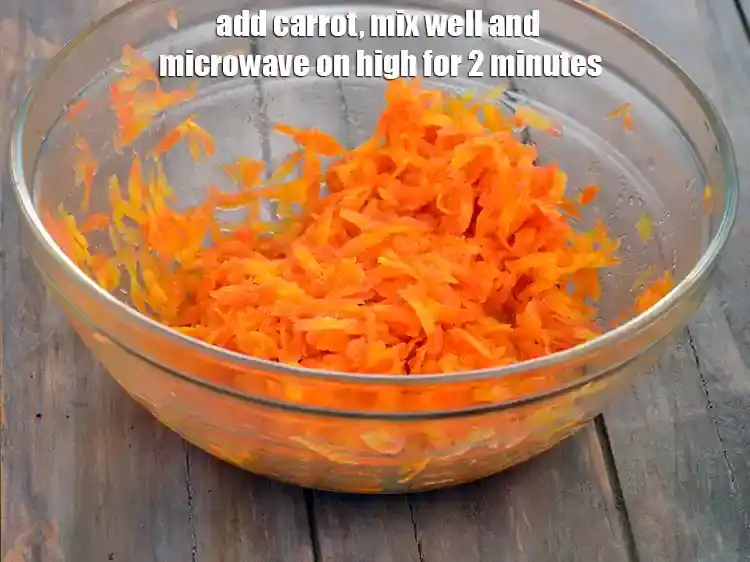 Step 5 – <p>Add the 1 1/2 cups <a href="https://www.tarladalal.com/glossary-carrot-gajar-gajjar-253i#ing_2385"><u>grated carrot</u></a>, mix well and microwave on high for …