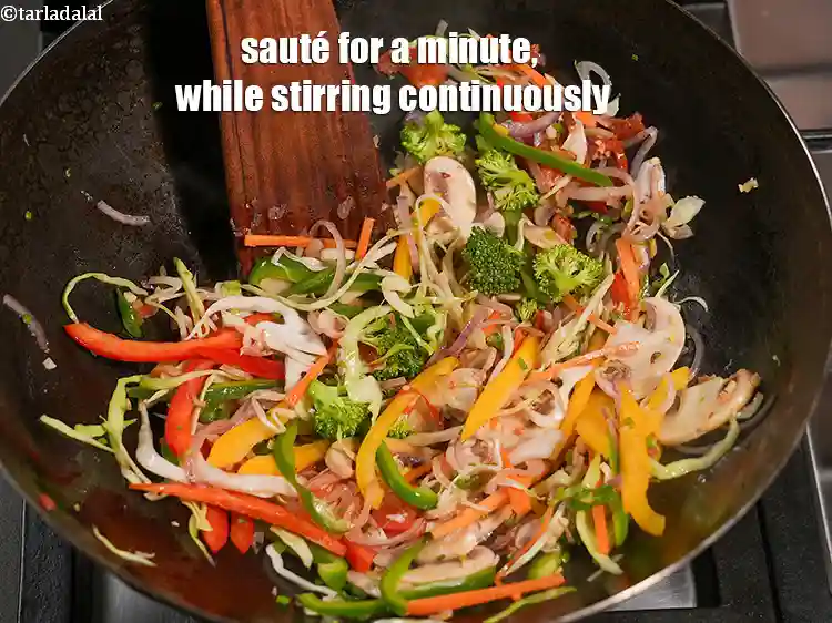 Step 21 – <p>Sauté for a minute, while stirring continuously.&nbsp;</p>