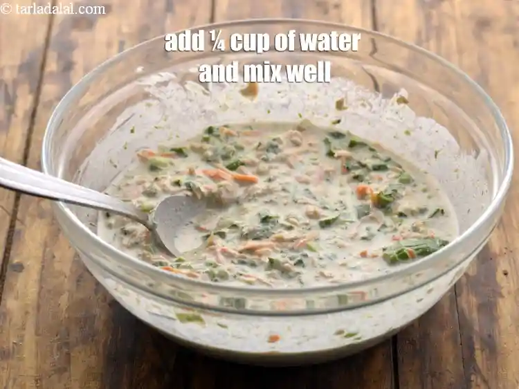 Step 17 – <p>Finally, add ¼ cup of water and mix well. Our batter for <strong>fibre rich chilla</strong> …