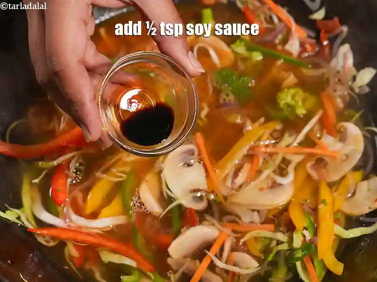Step 26 – <p>Add ½ tsp <a href="https://www.tarladalal.com/glossary-soy-sauce-soya-sauce-864i">soy sauce</a>.&nbsp;</p>