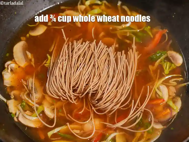 Step 30 – <p>Add ¾ cup <a href="https://www.tarladalal.com/glossary-whole-wheat-noodles-gehun-ke-noodles-atta-noodles-1549i">whole wheat noodles</a>.</p>