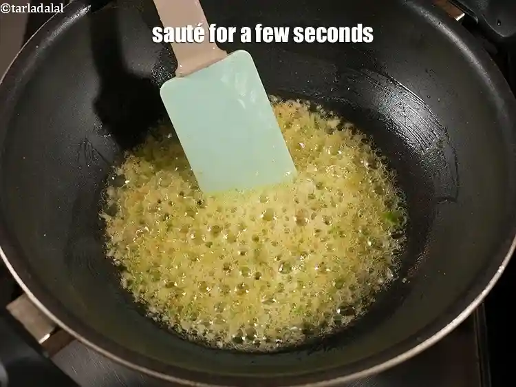 Step 28 – <p>Sauté for a few seconds.</p>