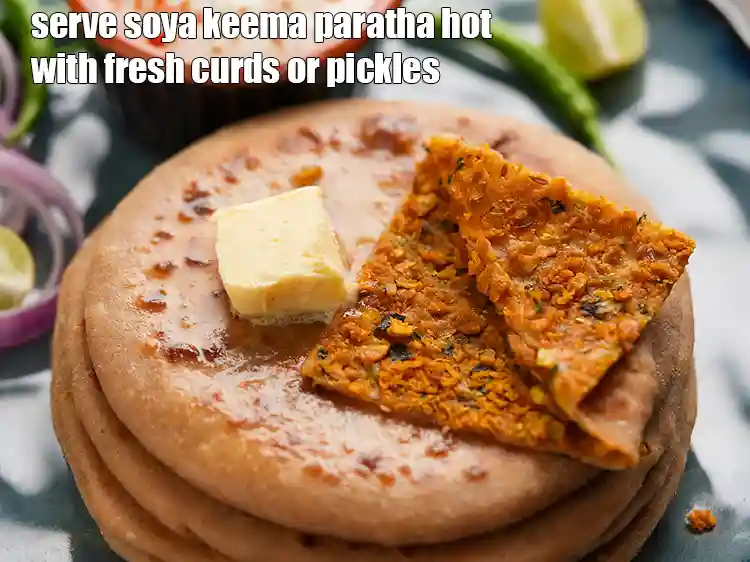 Step 47 – <html><head><meta charset="UTF-8"></head><body><p>Serve <strong>soya keema paratha </strong>hot with&nbsp;<a href="https://www.tarladalal.com/how-to-make-curd-or-dahi-at-home-2790r">curd</a>,&nbsp;<a href="https://www.tarladalal.com/low-fat-curds-for-weight-loss-diabetics-heart-and-acidity-3962r">low fat curds</a>,&nbsp; <a href="https://www.tarladalal.com/recipes-for-raita--176">raita</a>&nbsp;or&nbsp;<a href="https://www.tarladalal.com/recipes-for-Pickles-Achar-Recipes-Indian-Pickle-Recipes--246">achar</a>.&nbsp;</p></body></html>