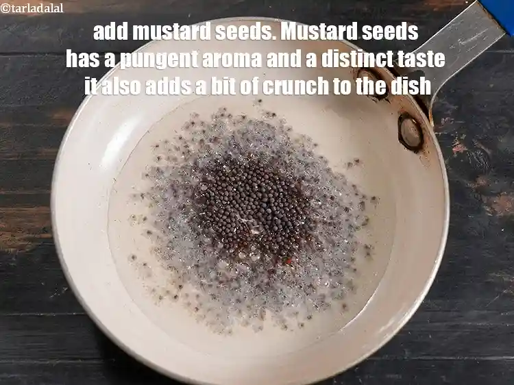 Step 10 – <p><span style="background-color:rgb(255,255,255);color:rgb(0,0,0);">Add 1 tsp </span><a href="https://www.tarladalal.com/glossary-mustard-seeds-sarson-rai-sarson-ke-beej-525i"><u>mustard seeds ( rai / sarson)</u></a><span style="background-color:rgb(255,255,255);color:rgb(0,0,0);">. Mustard seeds has …