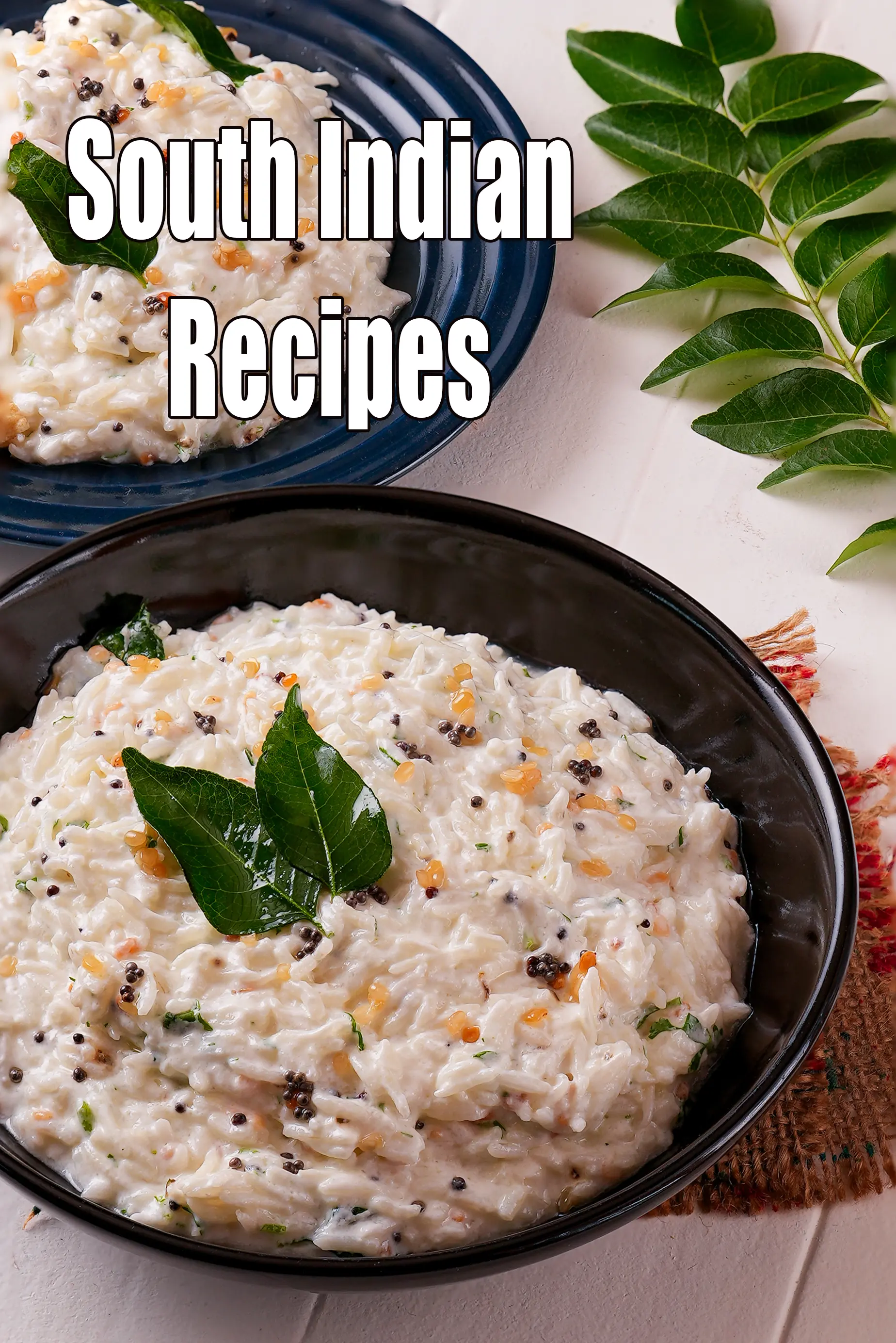 South Indian curd rice served in black bowls, garnished with curry leaves, mustard seeds, and lentils, placed on a light background with curry leaves on the side and the text “South Indian Recipes” displayed on the image.