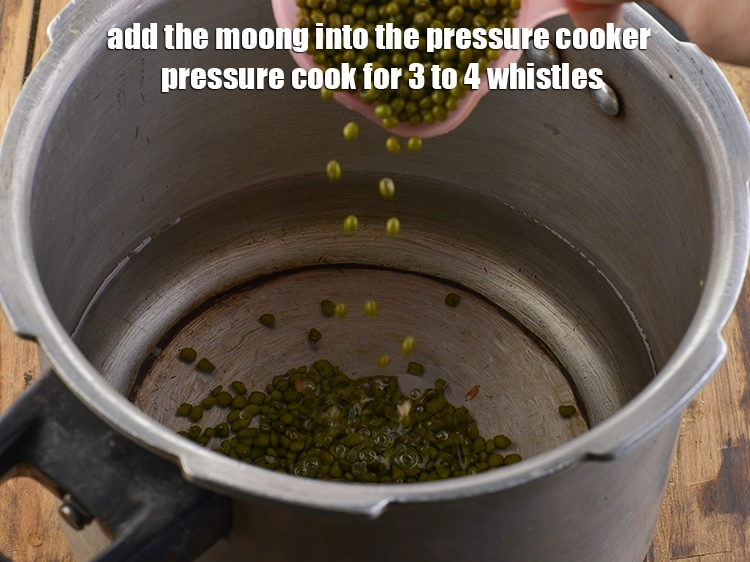 Step 3 – <p>પ્રેશર કુકરમાં મગ ઉમેરો અને ૩ થી ૪ સીટી વગાડો.</p>