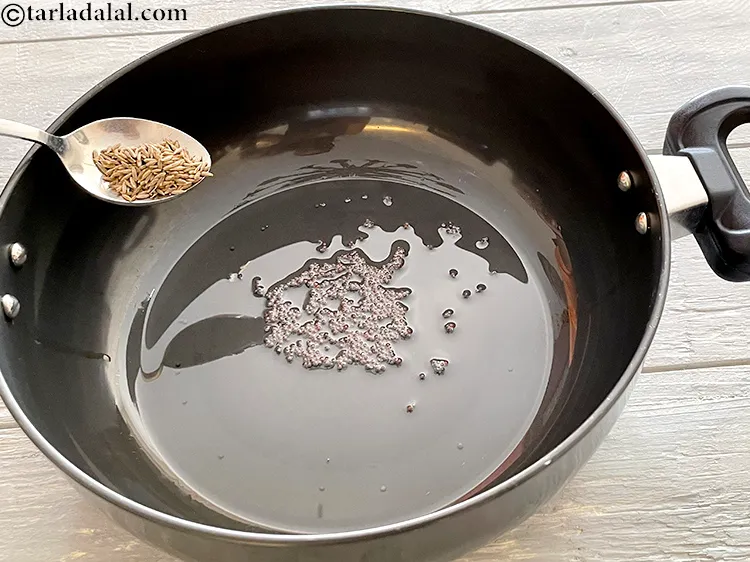 Step 3 – <p>જ્યારે બીજ તતડવા લાગે, ત્યારે તેમાં 1/2 ટીસ્પૂન <a href="/glossary-cumin-seeds-jeera-zeera-gujarati-381i"><u>જીરું ( cumin seeds, jeera)</u></a> ઉમેરો.</p>