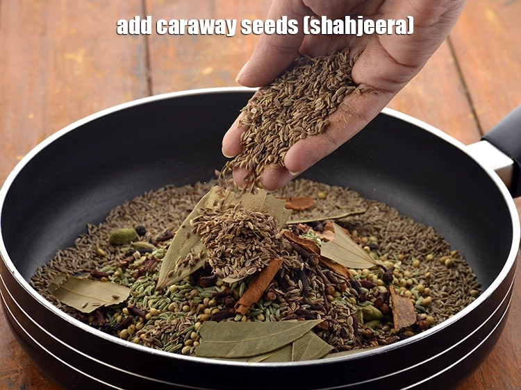 Step 12 – <p style="margin-left:0px;">2 ટેબલસ્પૂન <a href="/glossary-caraway-seeds-shahjeera-gujarati-261i"><u>વિલાયતી જીરૂ (caraway seeds, shahjeera)</u></a><u> ઉમેરો.</u> Add the caraway seeds (shahjeera).</p>