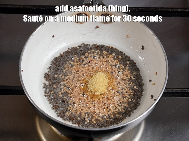 Step 24 – <p>૧/૪ ચમચી હિંગ ઉમેરો અને મધ્યમ તાપ પર ૩૦ સેકન્ડ સુધી સાંતળો. Add the <span …