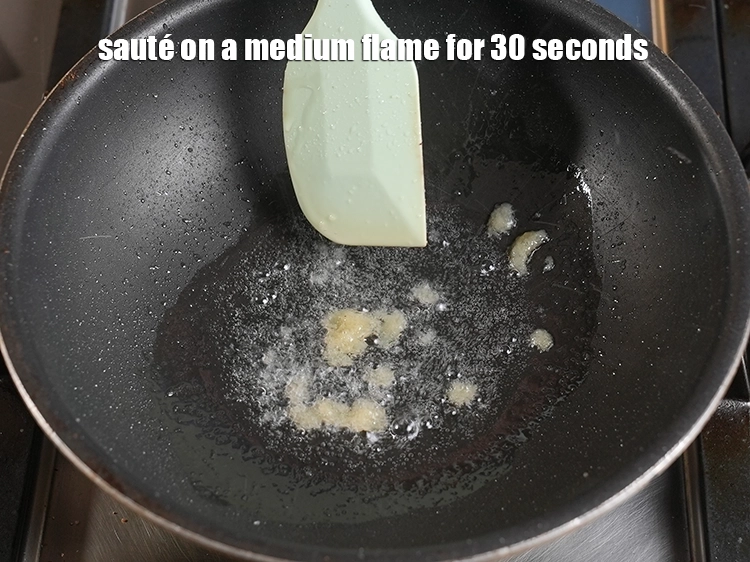Step 24 – <p>મધ્યમ તાપ પર ૩૦ સેકન્ડ સુધી સાંતળો. Sauté on a medium flame for 30 seconds.</p>