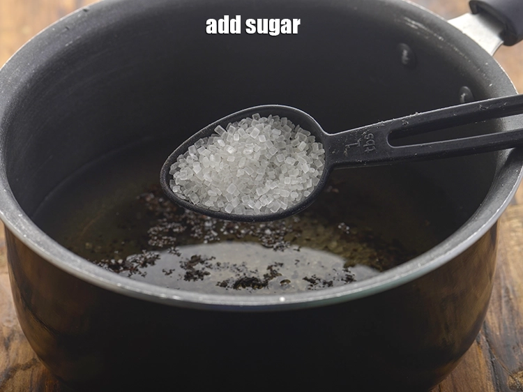 Step 4 – <p>ખાંડ ઉમેરો. તમારી પસંદગી મુજબ માત્રામાં ફેરફાર કરો. Add sugar. Adjust the quantity as per …