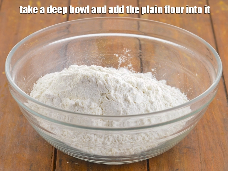 Step 7 – <p style="margin-left:0px;">એક ઊંડો બાઉલ લો અને તેમાં સાદો લોટ ઉમેરો. <strong>ભટુરા</strong>ના લોટને સ્વાદ આપવા માટે …