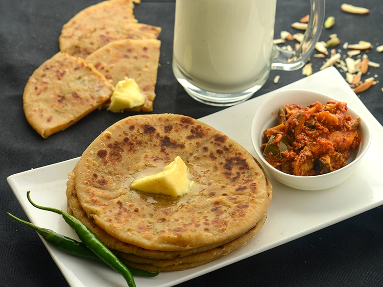 Step 29 – <p>આલુ પરાઠા નાસ્તા, બપોરના ભોજન અને રાત્રિભોજનમાં પણ માણી શકાય છે. દહીંને બદલે, સ્ટફ્ડ પરાઠા …