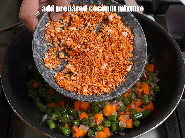 Step 21 – <p>તૈયાર કરેલું નારિયેળનું મિશ્રણ ઉમેરો. <span style="background-color:rgb(255,255,255);color:rgb(0,0,0);">Add the prepared coconut mixture.</span></p>