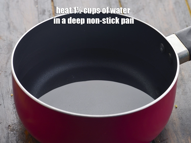 Step 6 – <p>તુલસી ચા બનાવવા માટે, એક નોન-સ્ટીક પેનમાં પાણી ગરમ કરો. To make&nbsp;<strong>Tulsi Tea,&nbsp;</strong>Heat water in …