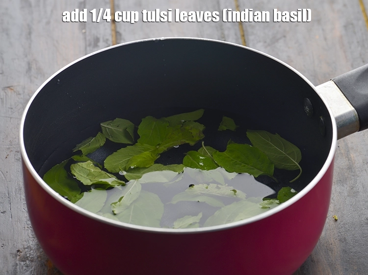 Step 7 – <p>તુલસીના પાન ઉમેરો. Add tulsi leaves.</p>